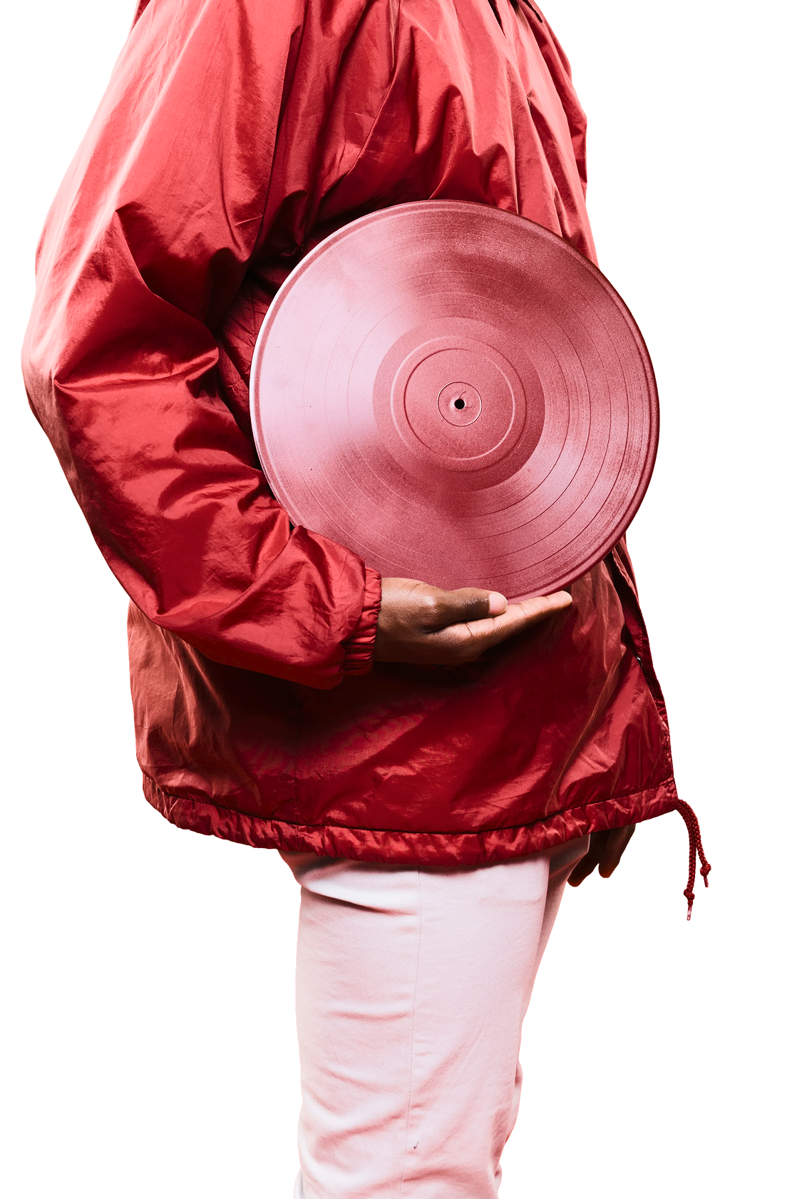 Pessoa de casaco vermelho segurando um disco de vinil